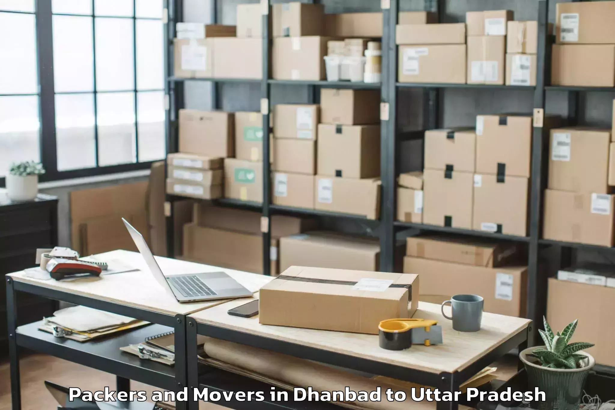 Trusted Dhanbad to Gola Gokarannath Packers And Movers